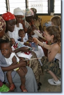 Hayley taking part in a national polio immunization campaign.  Children receive Vitamin A drops at the same time to boost the immune system.